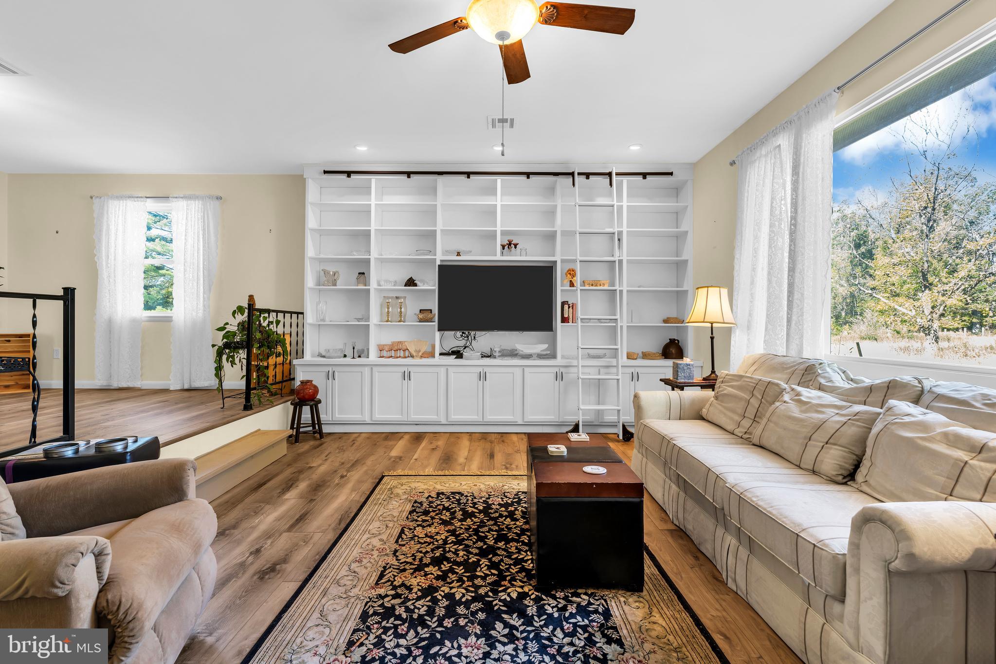 70 MacKenzie Road Hampton, NJ 08827 - Photo 25 of 45 a living room with furniture and a flat screen tv