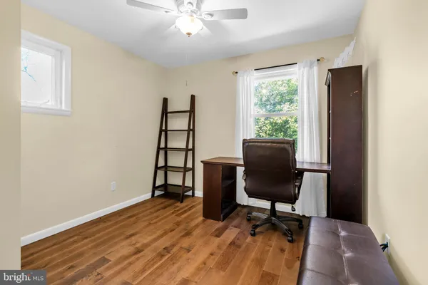 a room with furniture and a window