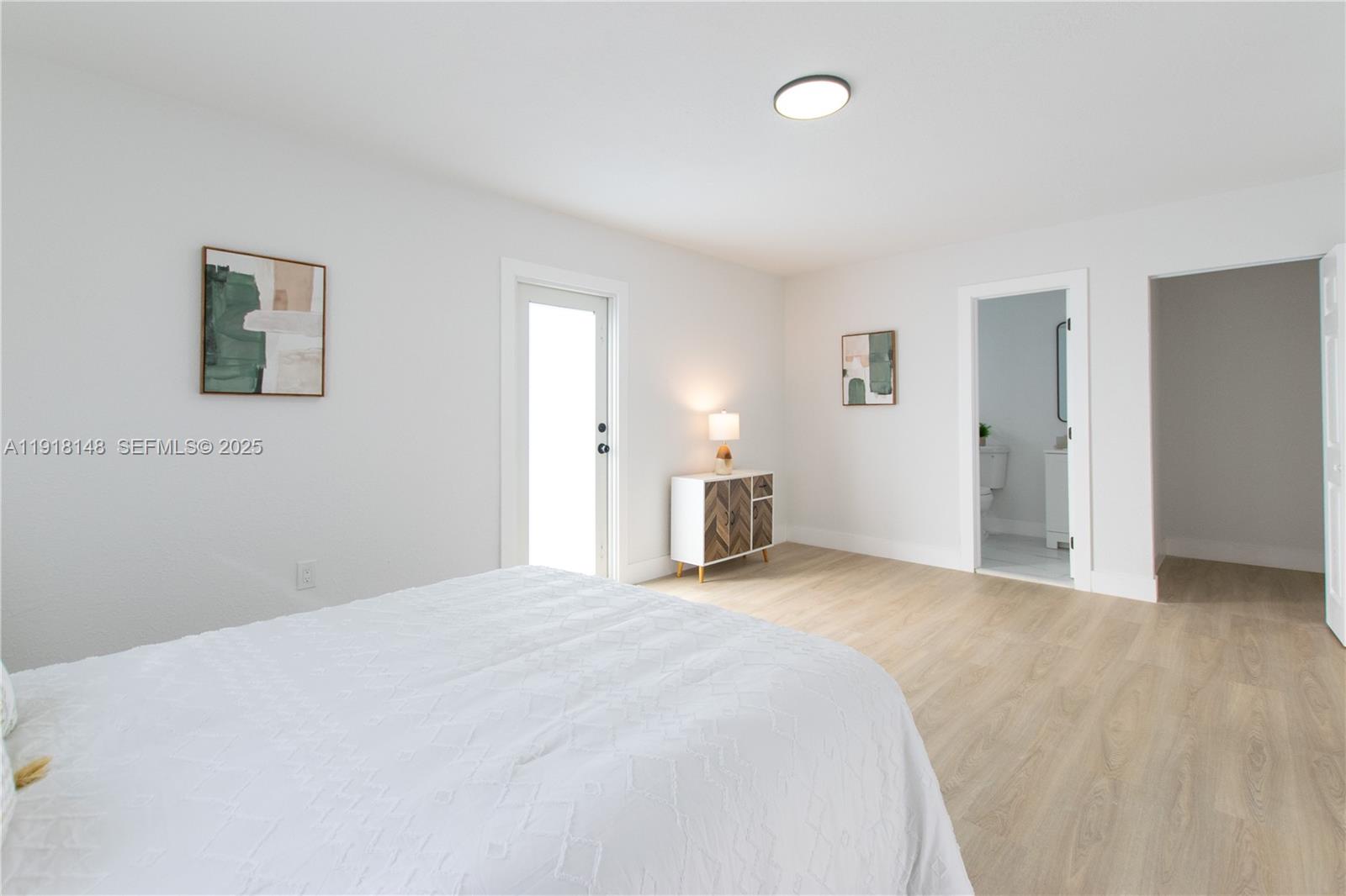 2250 Northwest 95th Terrace Miami, FL 33147 - Photo 11 of 18 a view of a bedroom with a bedroom