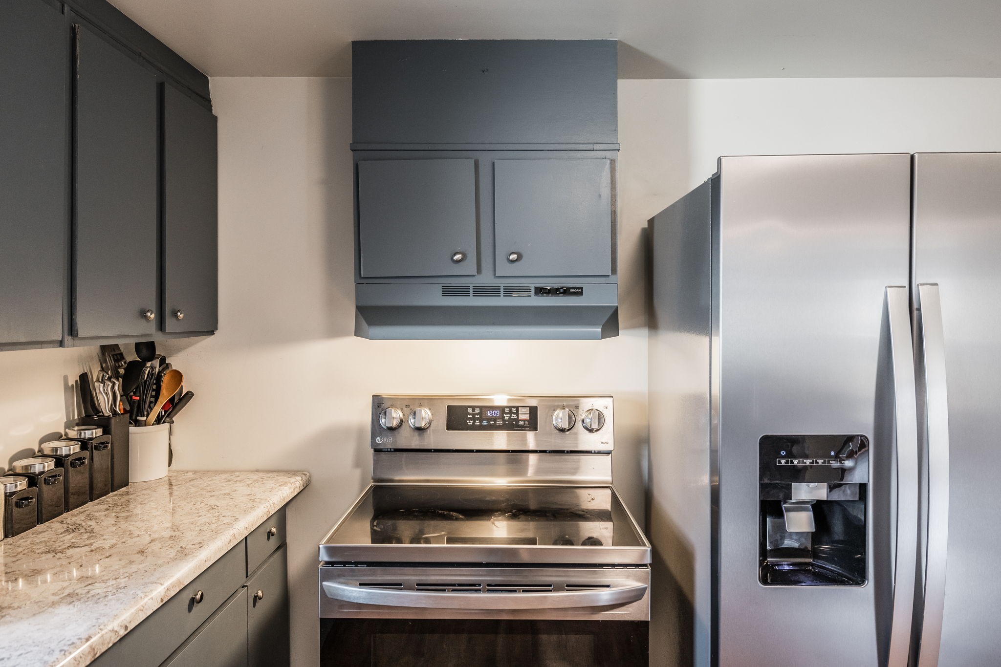 145 New Deal Potts Road Cottontown, TN 37048 - Photo 16 of 40 a kitchen with a stove and a refrigerator