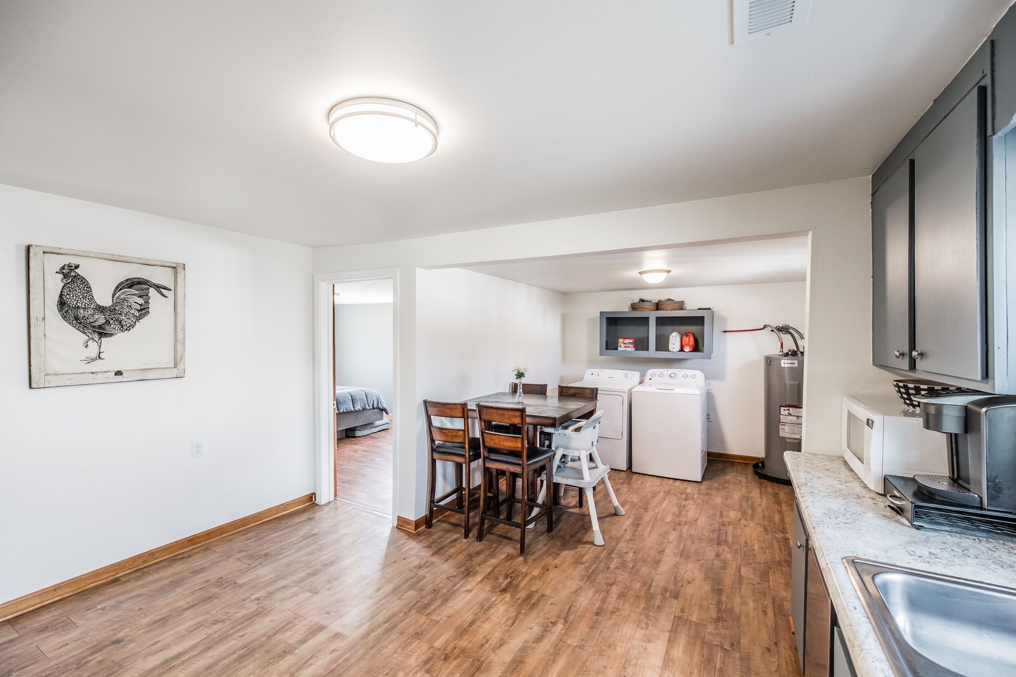 145 New Deal Potts Road Cottontown, TN 37048 - Photo 17 of 40 a view of a dining room with furniture and wooden floor