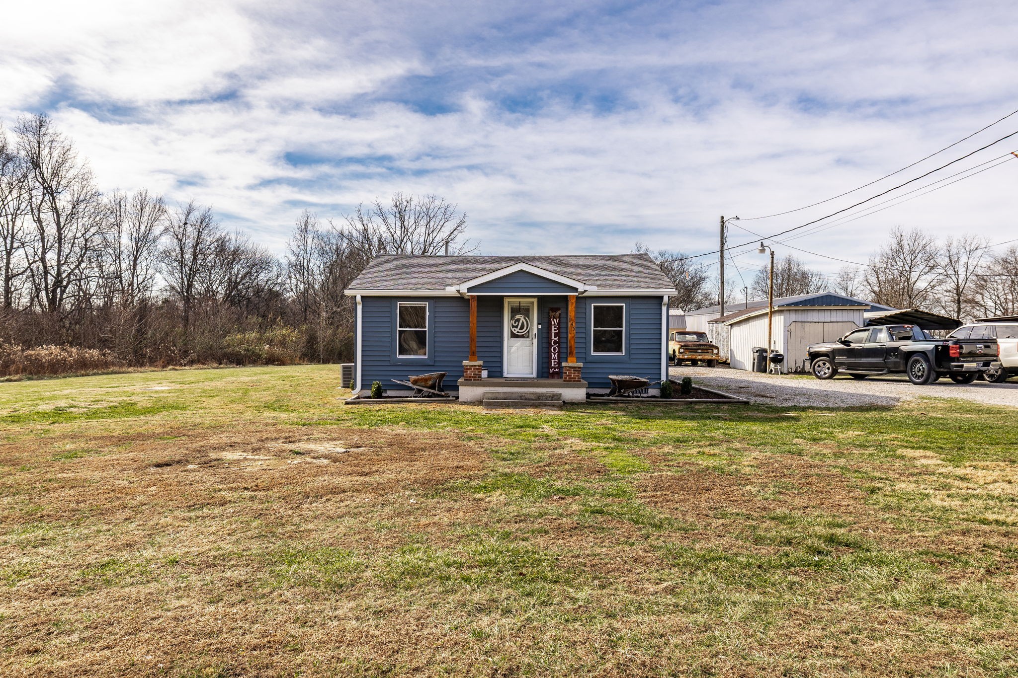 145 New Deal Potts Road Cottontown, TN 37048 - Photo 2 of 40 a view of a house with swimming pool and a yard
