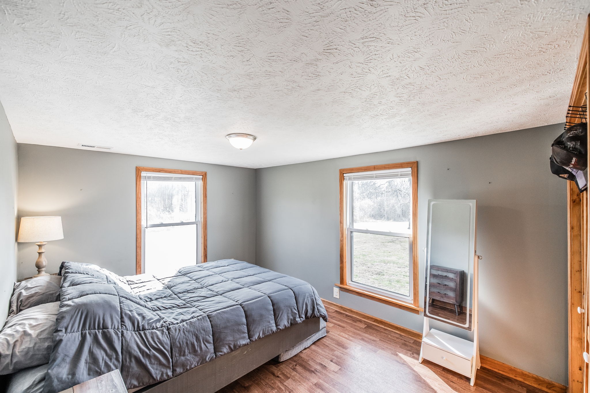 145 New Deal Potts Road Cottontown, TN 37048 - Photo 22 of 40 a bedroom with a bed and a window