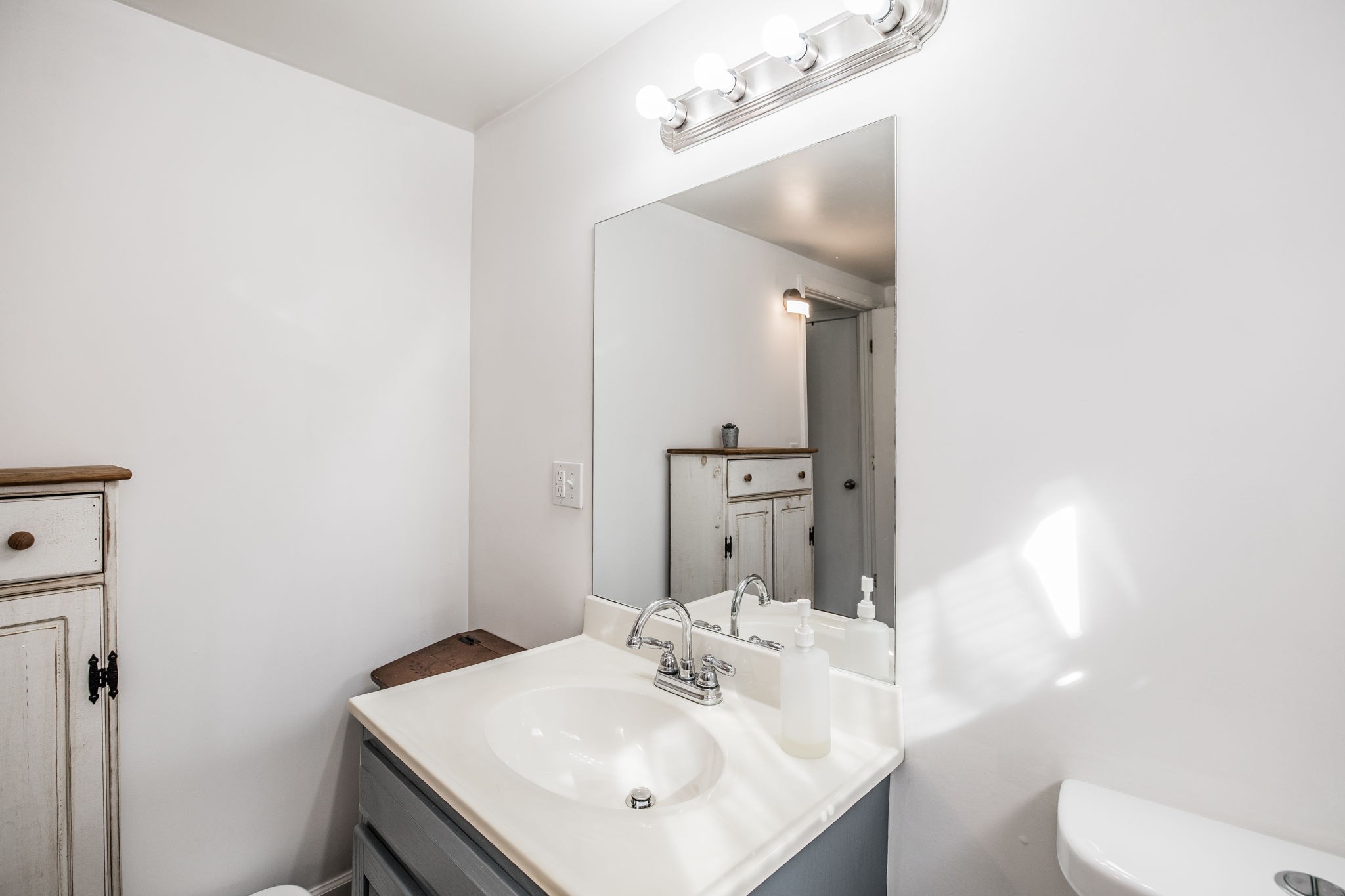 145 New Deal Potts Road Cottontown, TN 37048 - Photo 27 of 40 a bathroom with a sink toilet and mirror