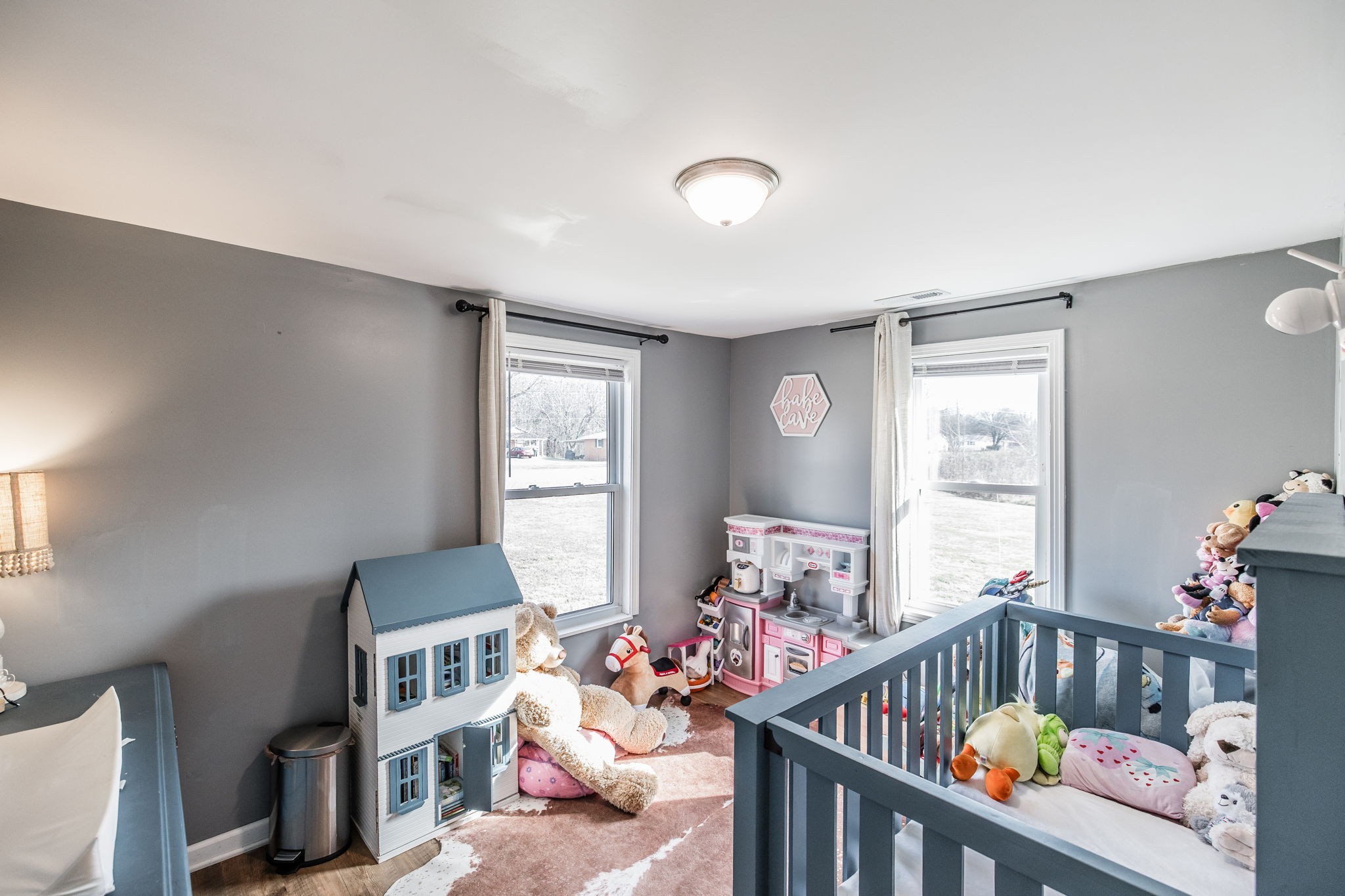 145 New Deal Potts Road Cottontown, TN 37048 - Photo 28 of 40 a bedroom with furniture a baby crib and a window