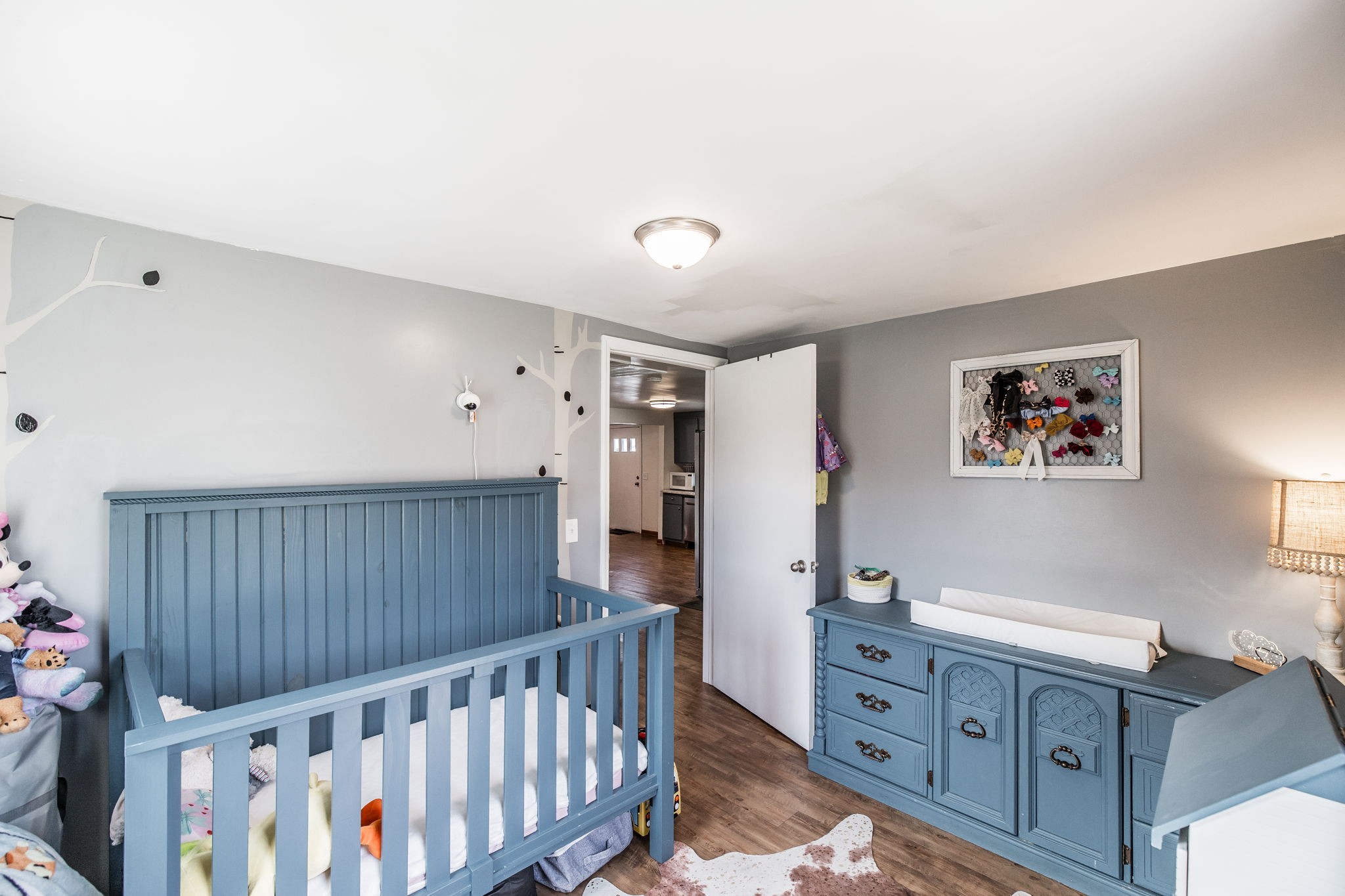 145 New Deal Potts Road Cottontown, TN 37048 - Photo 29 of 40 a view of a bedroom with furniture window and wooden floor