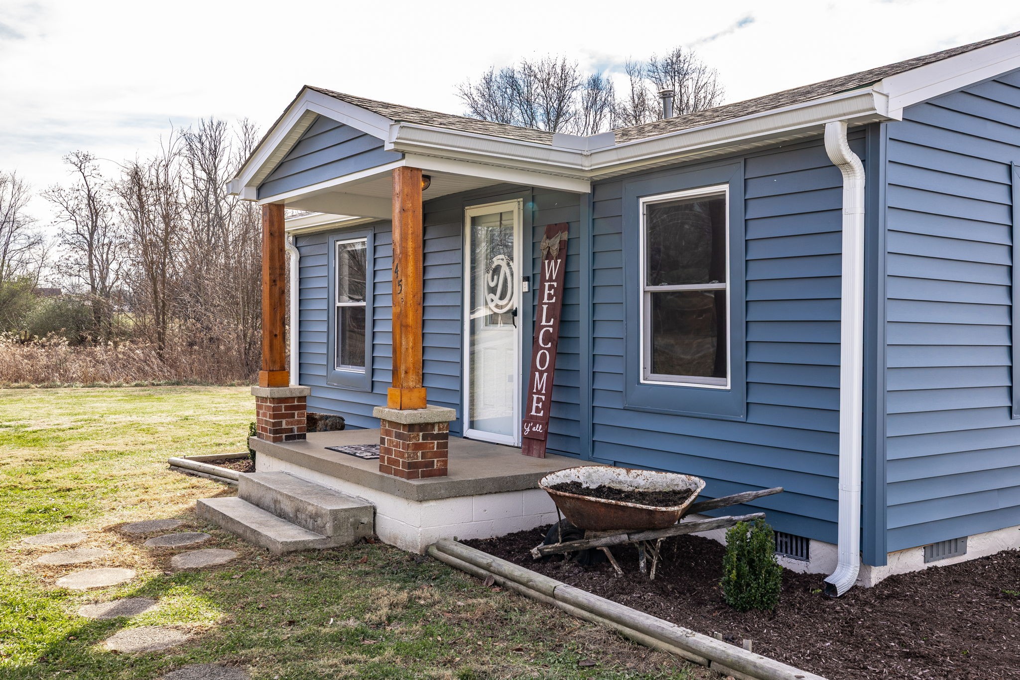 145 New Deal Potts Road Cottontown, TN 37048 - Photo 3 of 40 a view of a house with backyard and sitting area