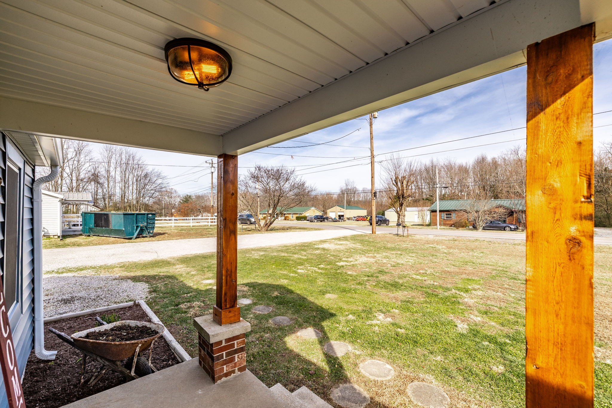 145 New Deal Potts Road Cottontown, TN 37048 - Photo 6 of 40 a view of a floor to ceiling window with a flat screen tv