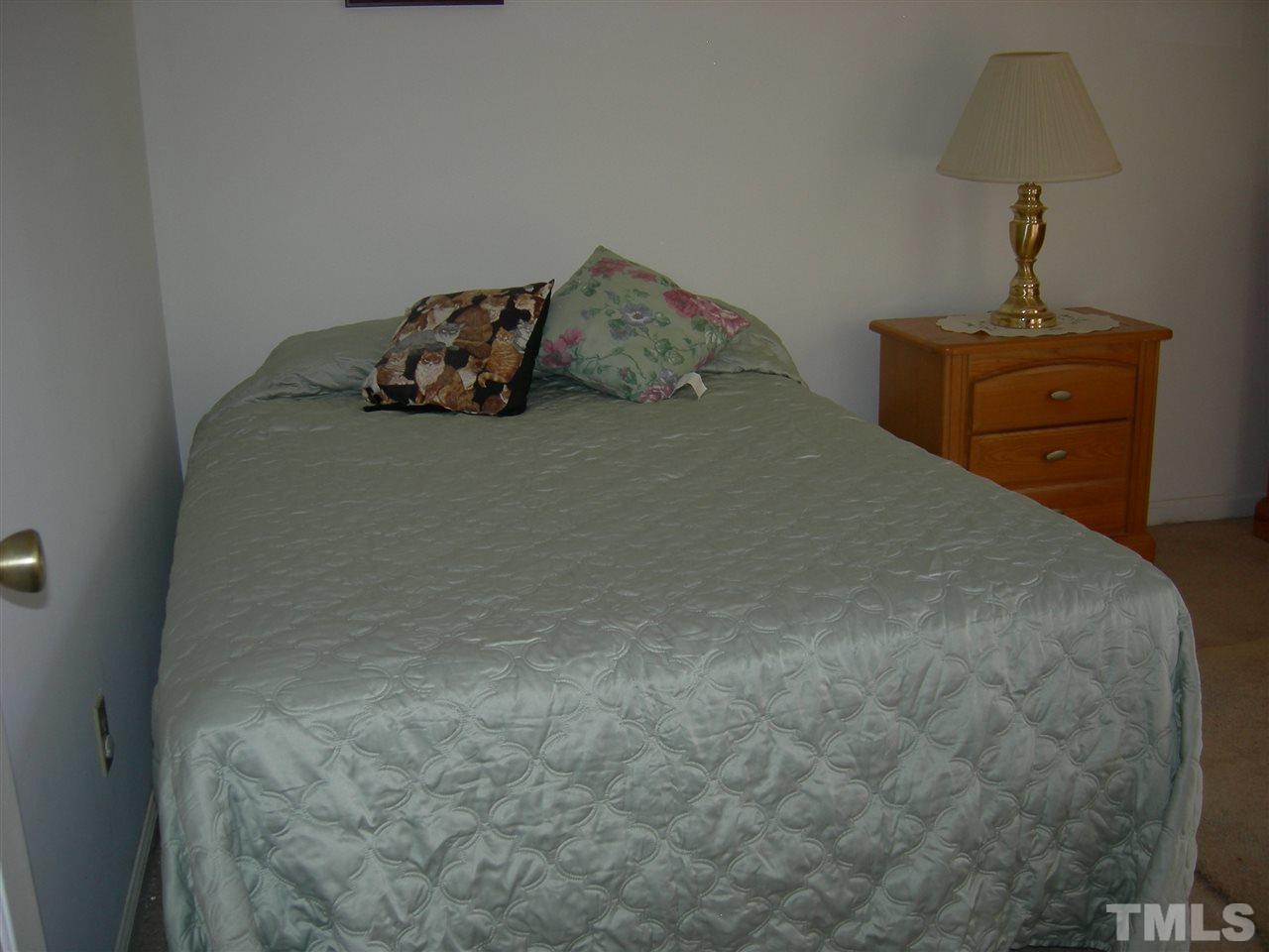 105 Galloway Court Raleigh, NC 27615 - Photo 11 of 30 This bedroom has a walk-in closet.