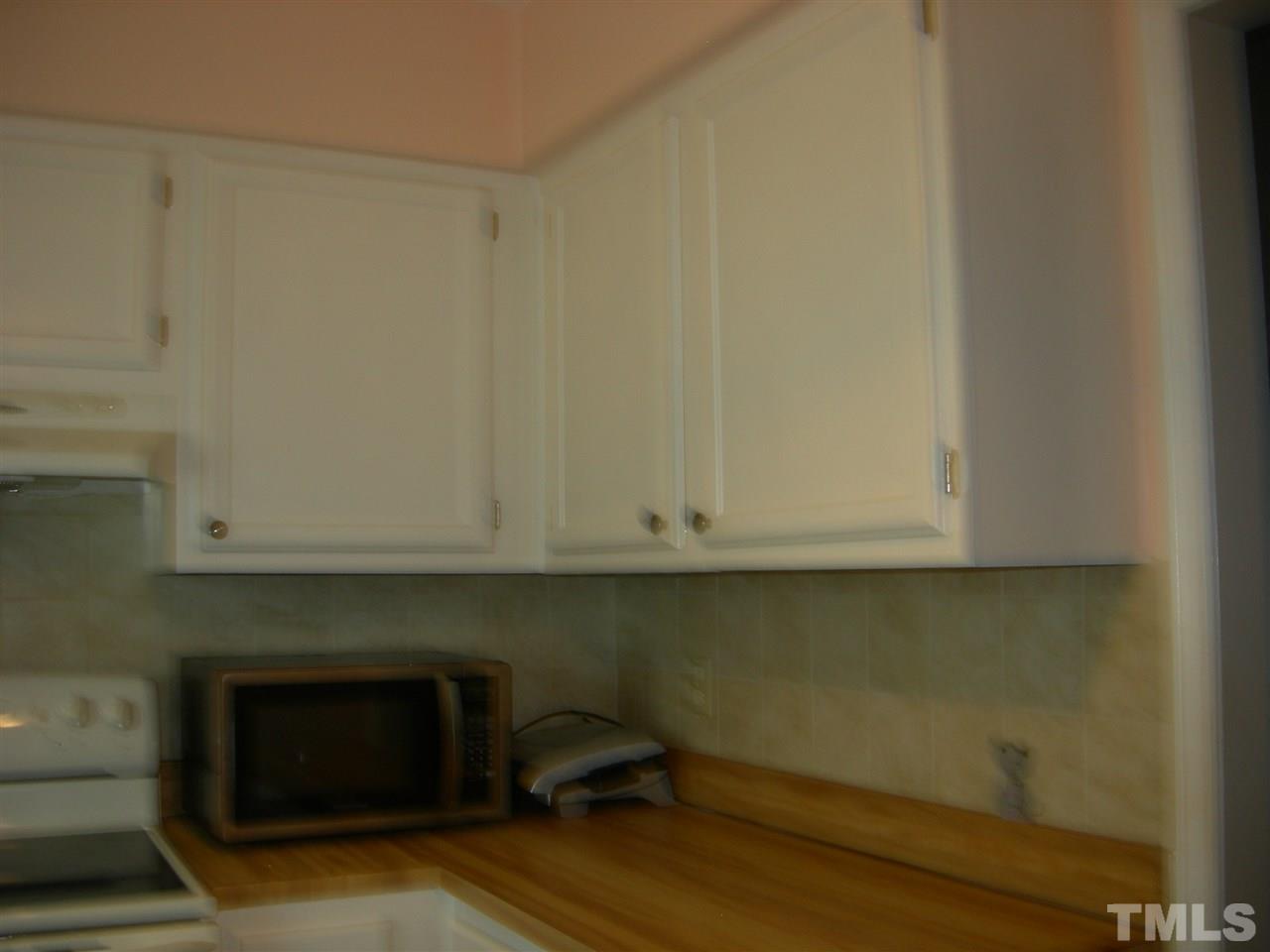 105 Galloway Court Raleigh, NC 27615 - Photo 5 of 30 Tile backsplash.