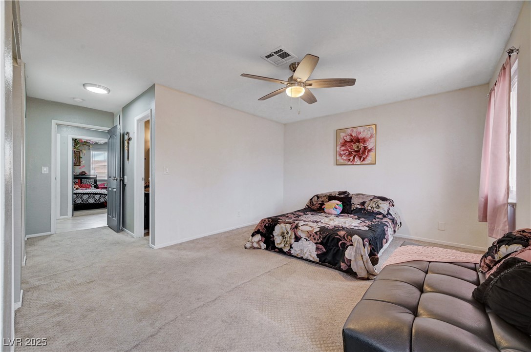 2829 Michael Way Las Vegas, NV 89108 - Photo 41 of 60 Bedroom featuring carpet and a ceiling fan