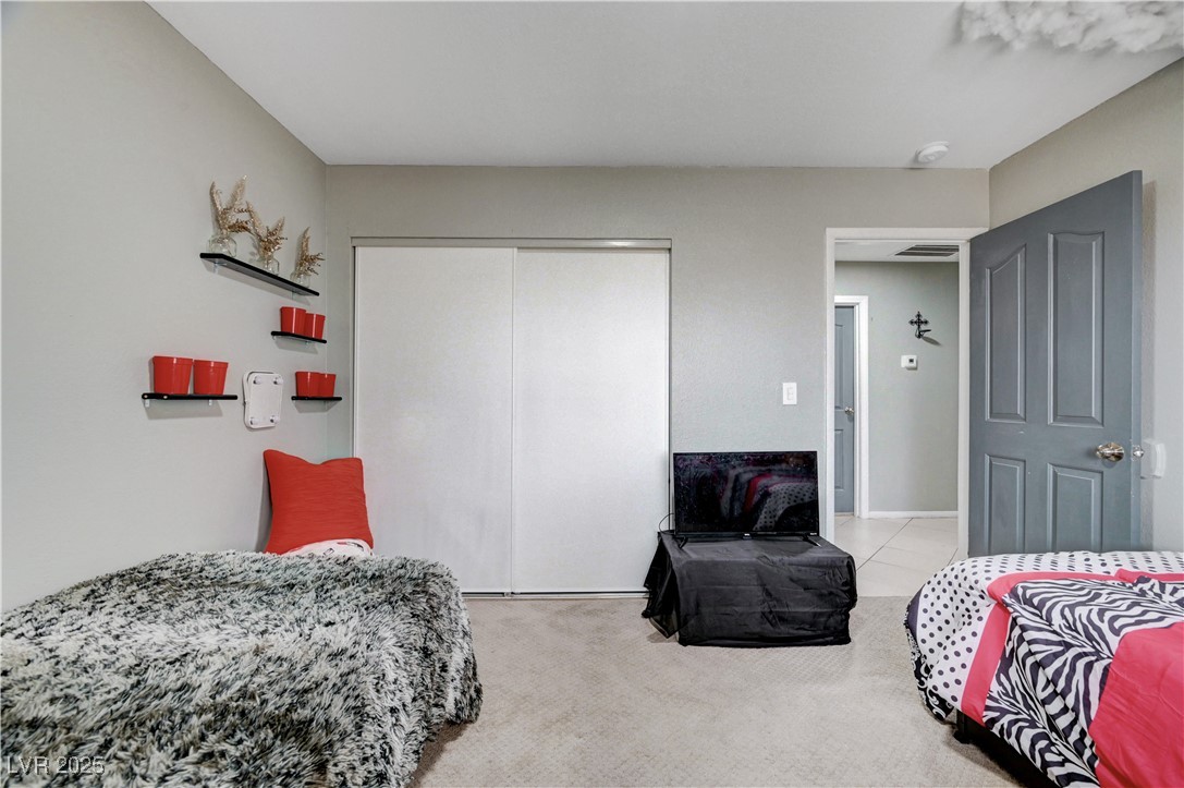 2829 Michael Way Las Vegas, NV 89108 - Photo 47 of 60 Carpeted bedroom with a closet