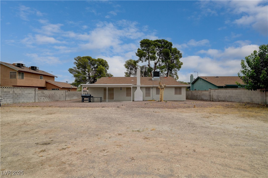 2829 Michael Way Las Vegas, NV 89108 - Photo 55 of 60 Back of house featuring a patio area and a fenced backyard