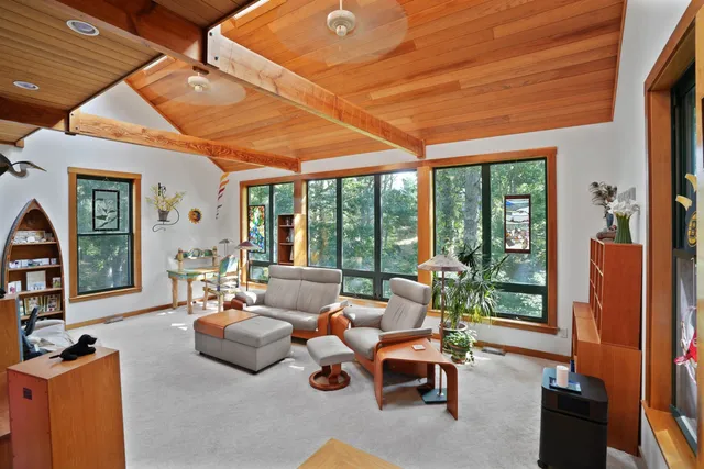 a outdoor space with patio couch and glass windows