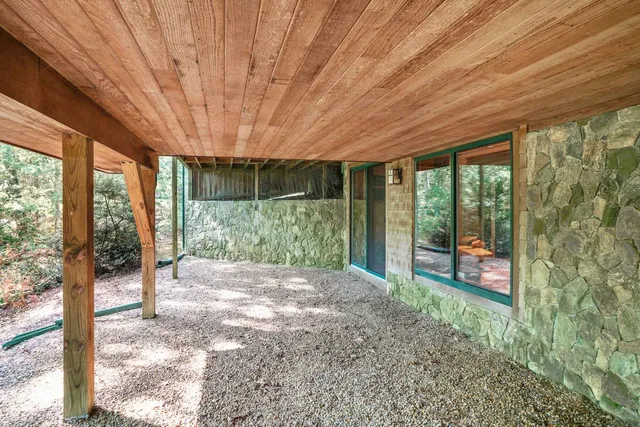 a very nice looking room with a large tree