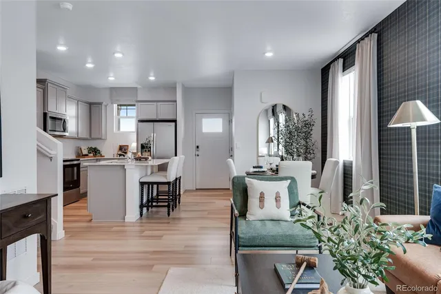 a view of kitchen with dining table and chairs