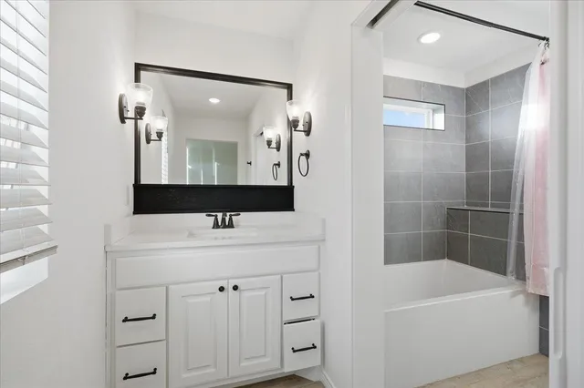 a workspace with furniture wooden floor and windows