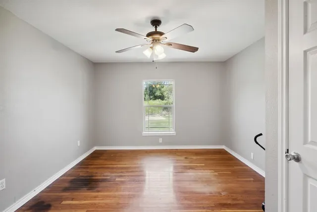 a view of an empty room and window