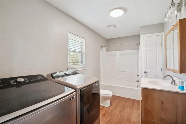 a bathroom with a sink and a bathtub