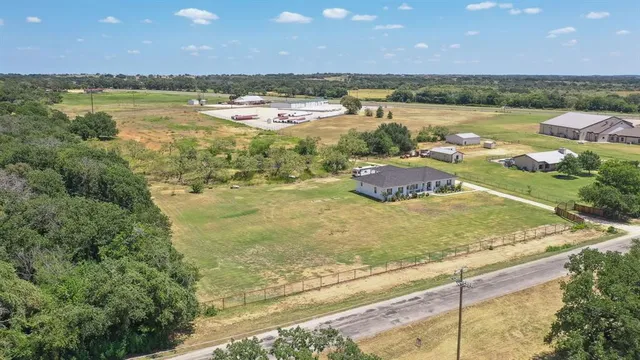 a view of a lake with a yard