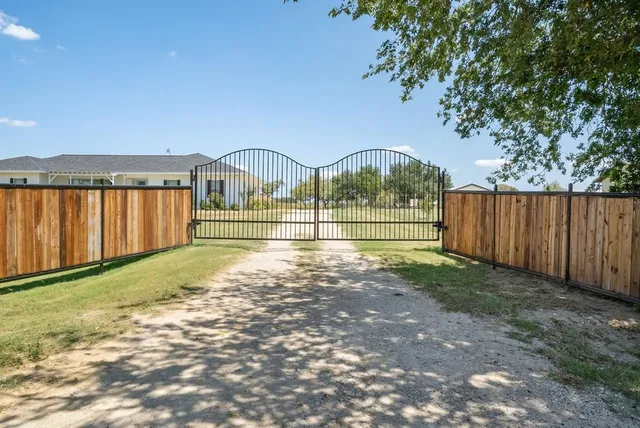 a view of backyard with green space