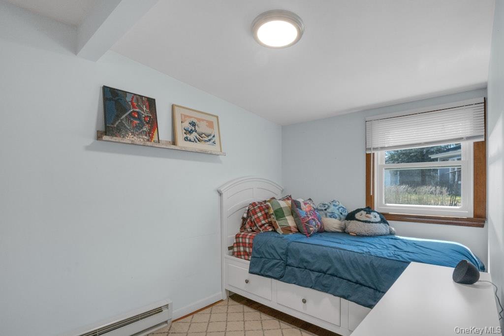 10 Locust Road Brewster, NY 10509 - Photo 8 of 21 a bedroom with a bed and a window