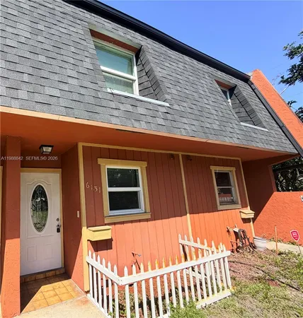 a view of a house with a deck