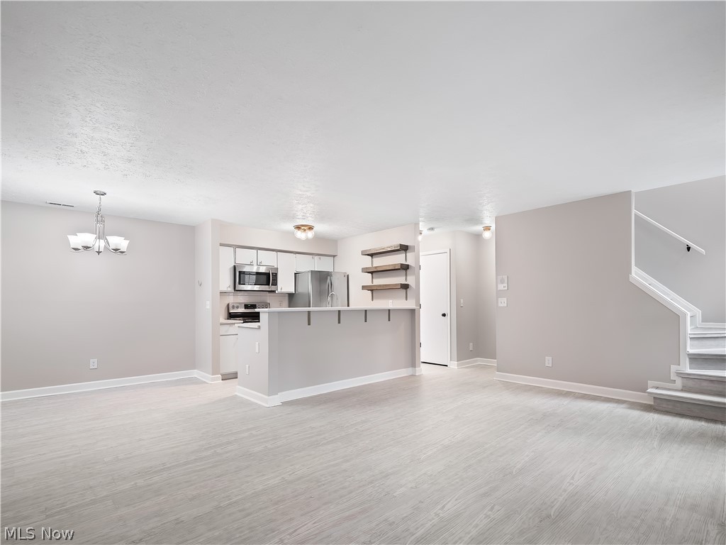28300 Detroit Road, Unit D3 Westlake, OH 44145 - Photo 12 of 37 Great room, kitchen and dining area