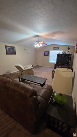1330 North Dixie Downs Road, Unit 72 St. George, UT 84770 - Photo 21 of 21 Living room featuring carpet flooring and a ceiling fan