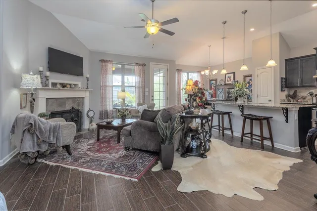 a room that has a sink and a plant in it
