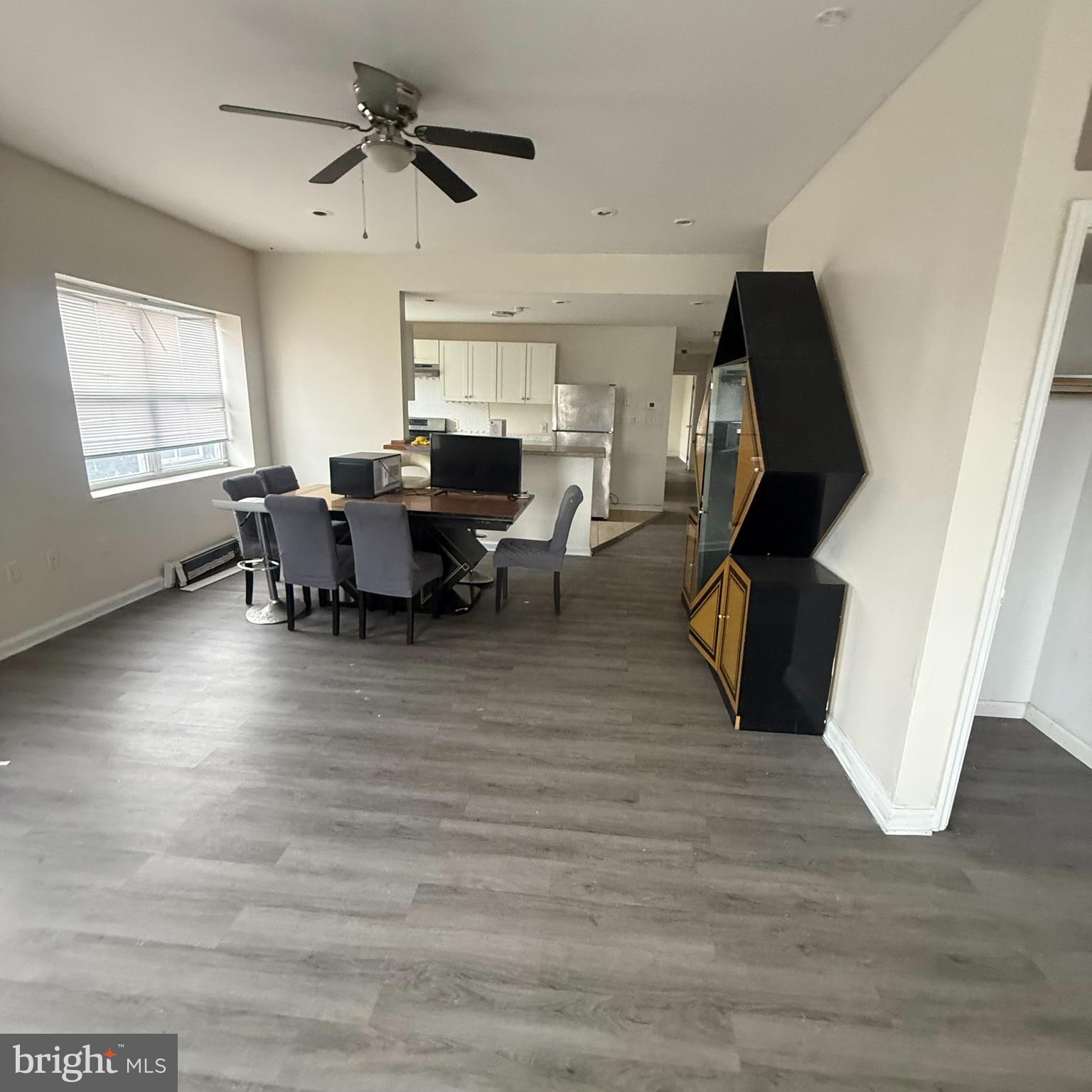 6805-07 Marshall Road Upper Darby, PA 19082 - Photo 6 of 11 a view of a dining room with furniture window and wooden floor