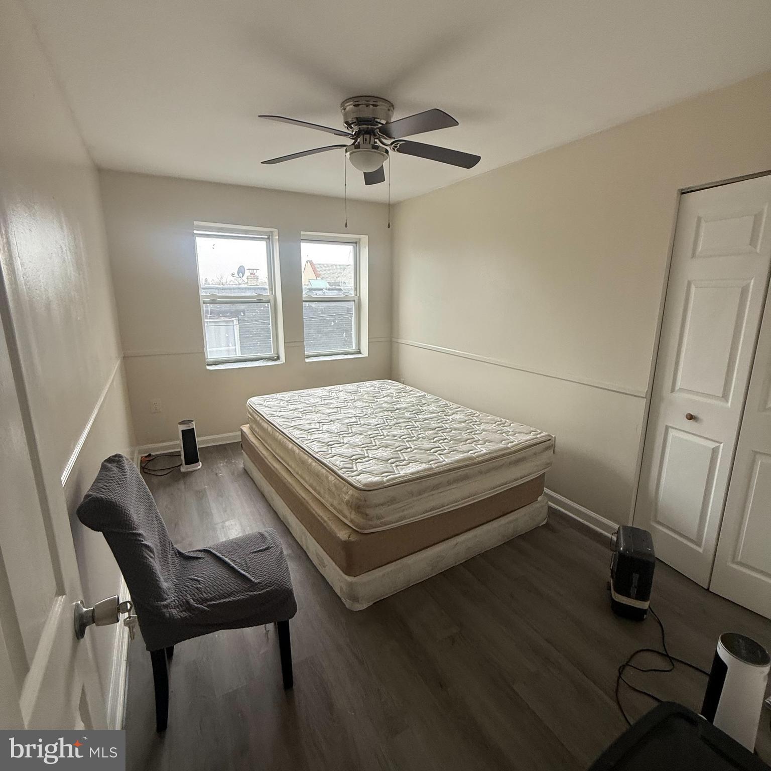 6805-07 Marshall Road Upper Darby, PA 19082 - Photo 7 of 11 a bedroom with a bed and a desk