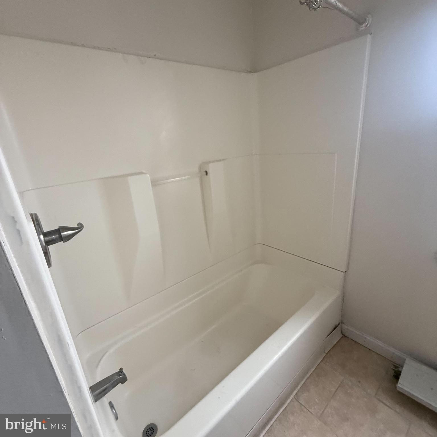 6805-07 Marshall Road Upper Darby, PA 19082 - Photo 10 of 11 a bathroom with a bathtub