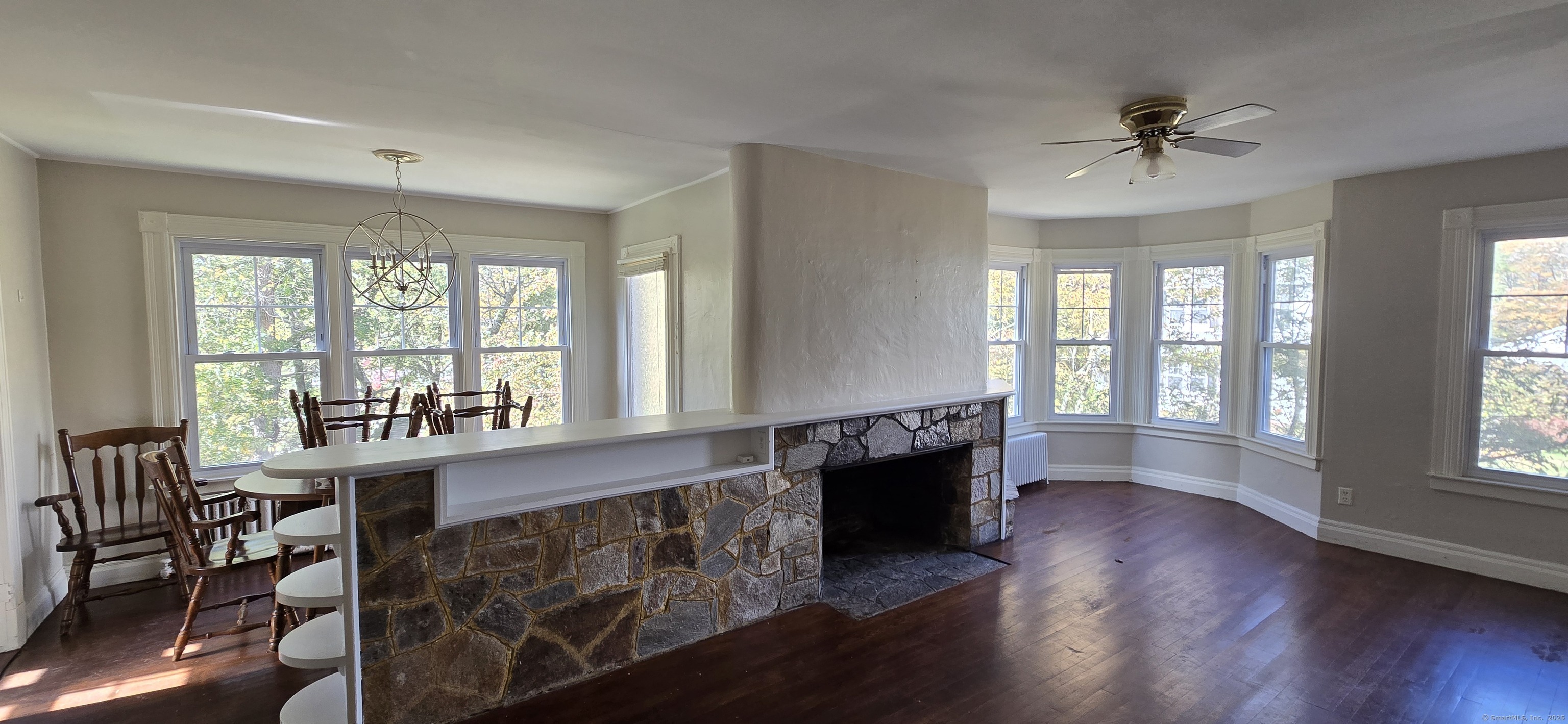 40 Maple Grove Avenue Norwich, CT 06360 - Photo 11 of 18 wooden floor in an empty room with a window