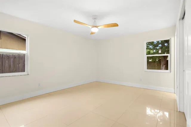 a view of a small space with a book shelf