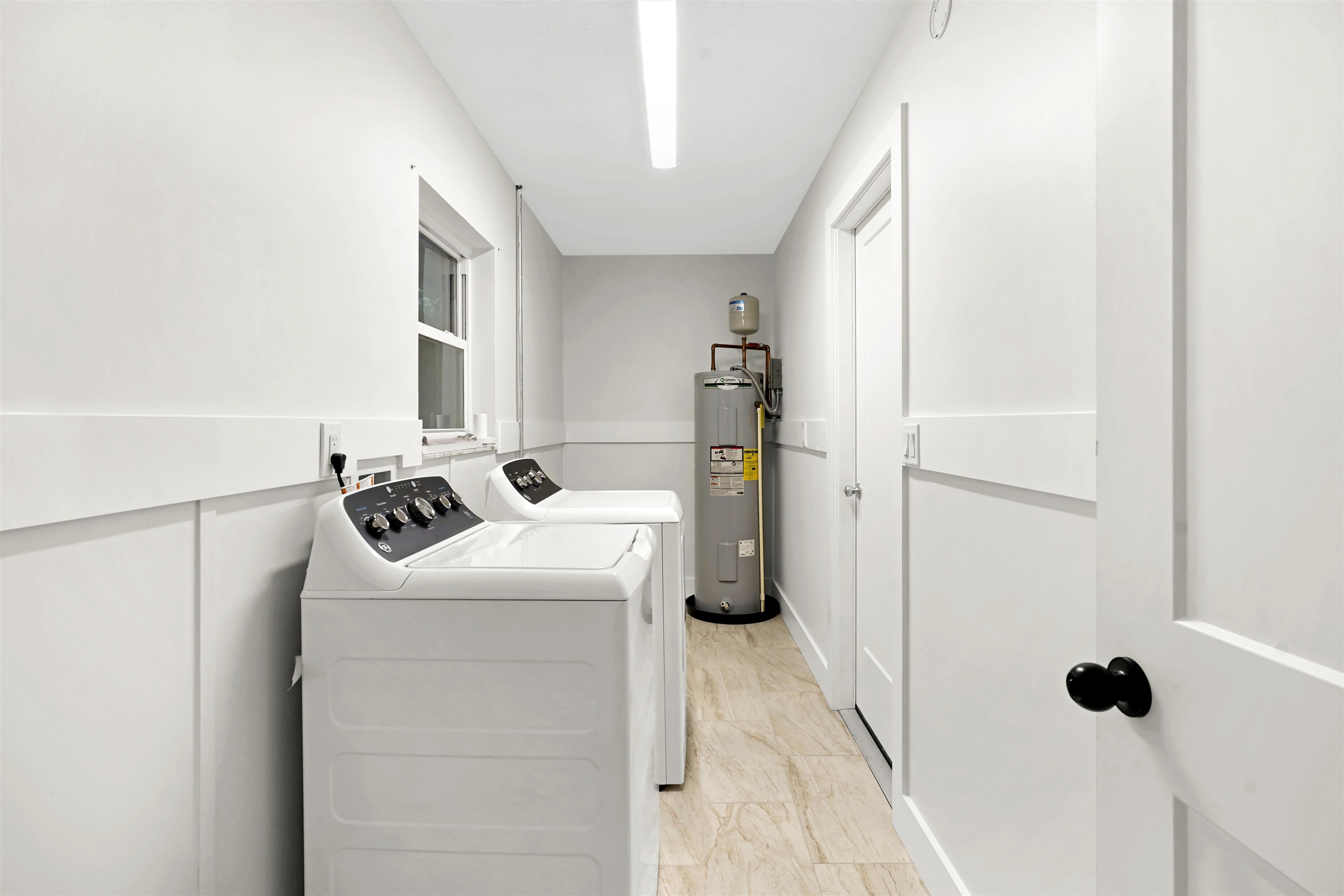 212 F Street St. Augustine, FL 32080 - Photo 24 of 35 a utility room with washer and dryer