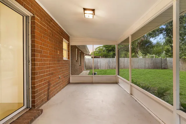 a view of a room with a large window