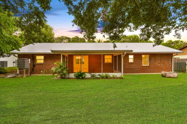 a view of a backyard with a garden
