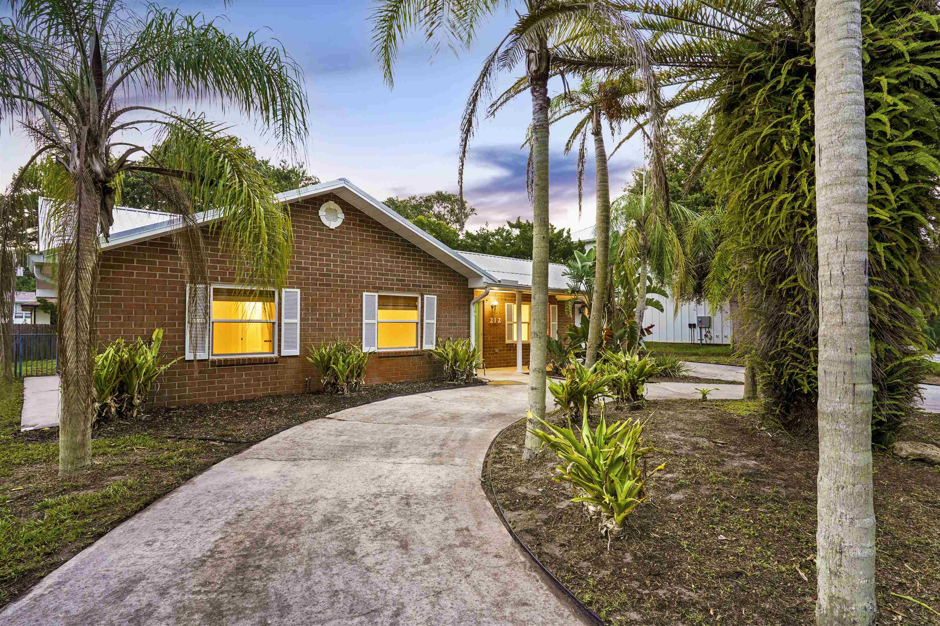 212 F Street St. Augustine, FL 32080 - Photo 31 of 35 a view of a house with a patio