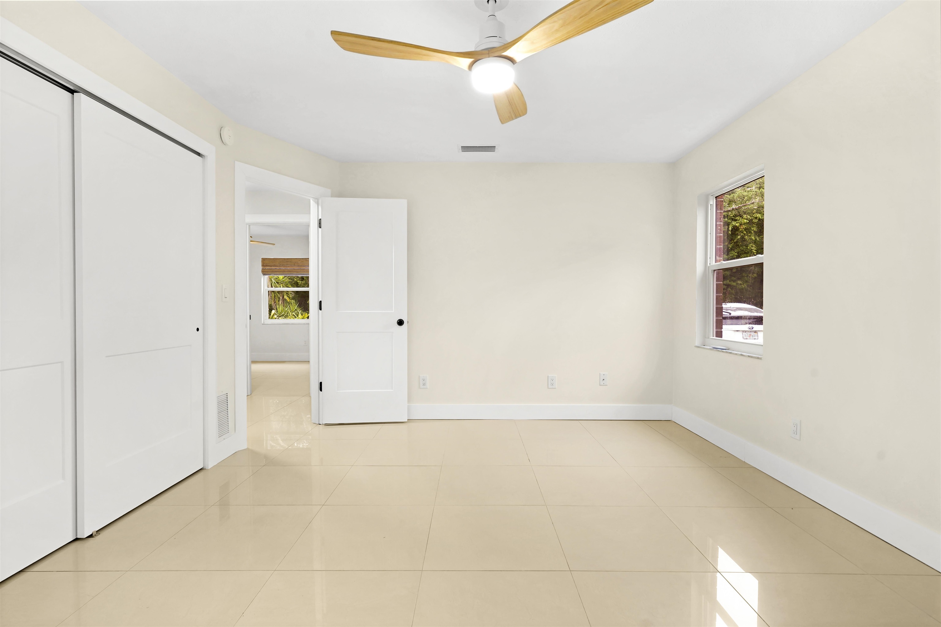 212 F Street St. Augustine, FL 32080 - Photo 4 of 35 a view of an empty room with a window