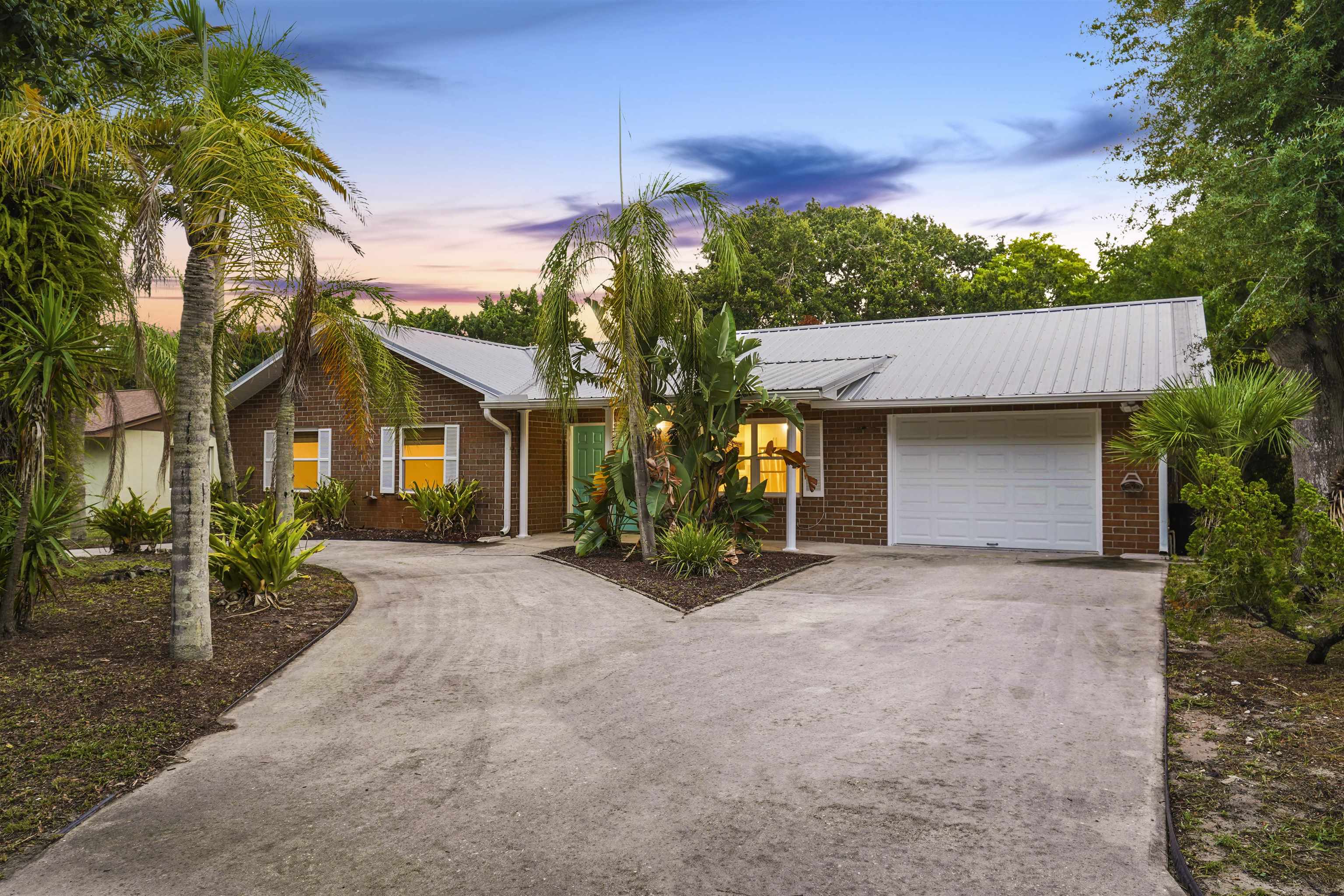 212 F Street St. Augustine, FL 32080 - Photo 7 of 35 front view of a house with a porch