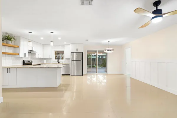 a view of kitchen with wooden floor