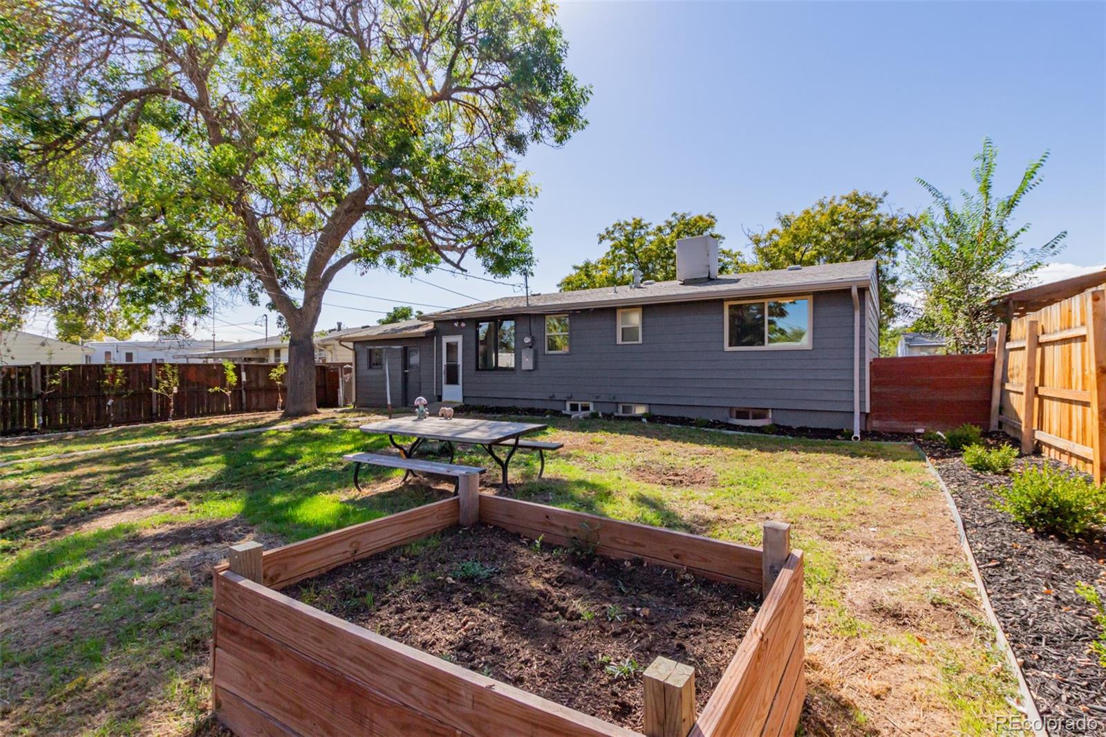 7330 Decatur Street Westminster, CO 80030 - Photo 34 of 37 front view of a house with a yard