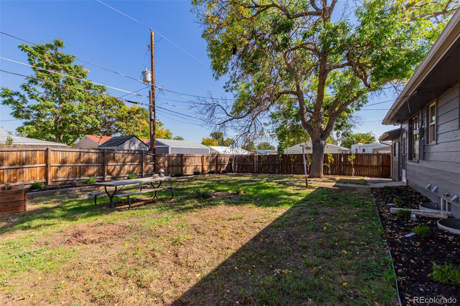 7330 Decatur Street Westminster, CO 80030 - Photo 36 of 37 a backyard of a house with lots of green space