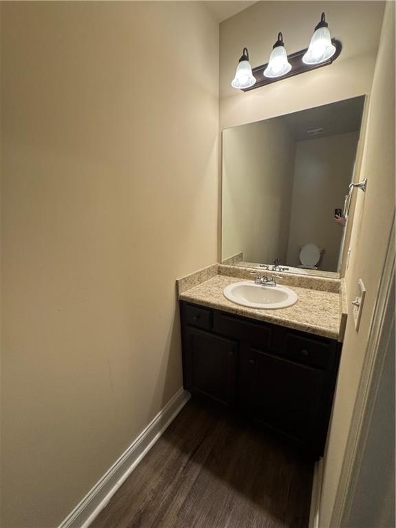2287 Church Street Hampton, GA 30228 - Photo 7 of 11 a bathroom with a sink and a mirror