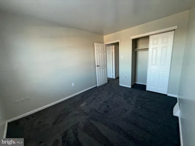 an empty room with closet