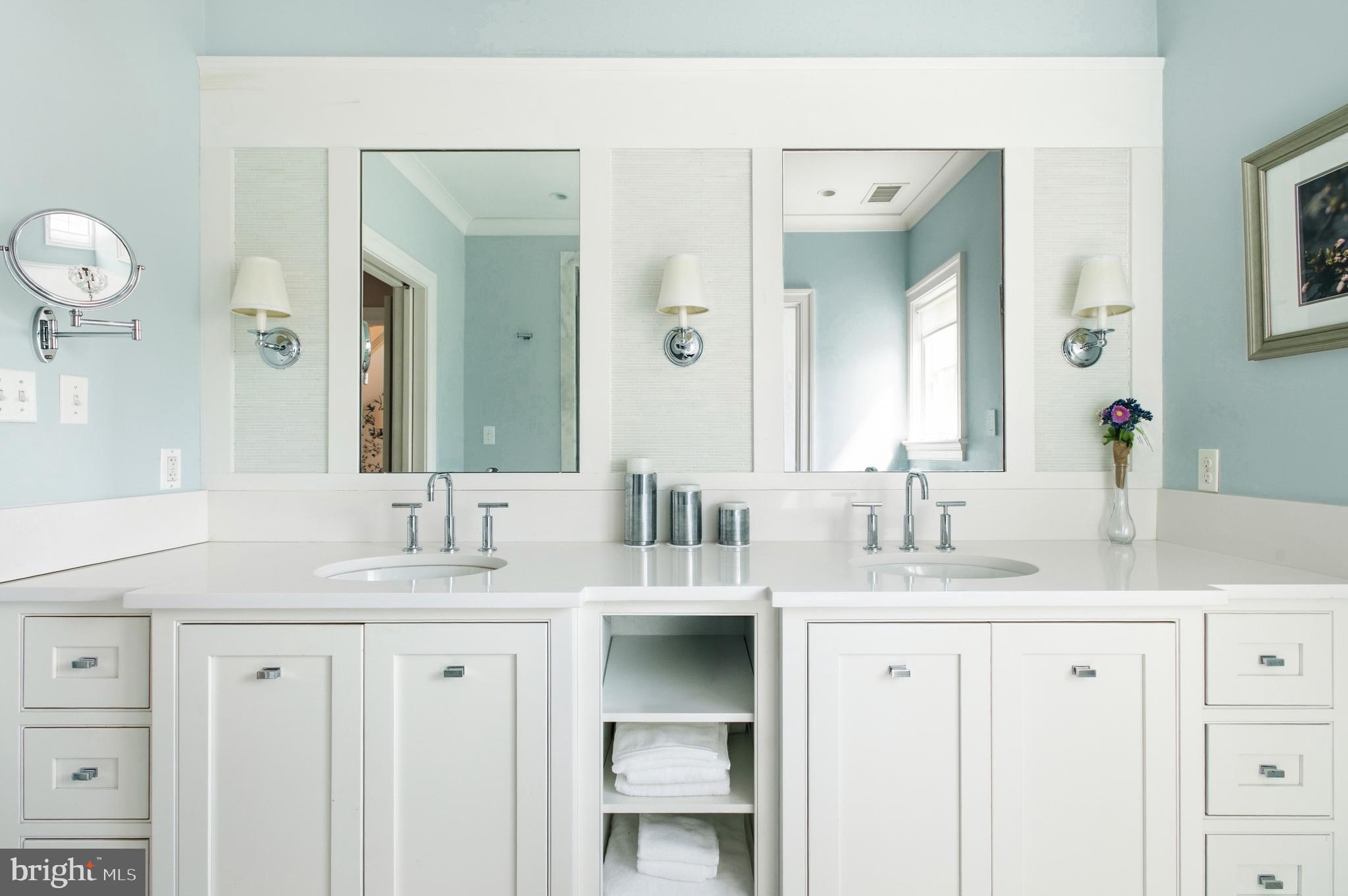 3312 Lowell Street Northwest Washington, DC 20008 - Photo 18 of 44 a bathroom with a double vanity sink and a mirror