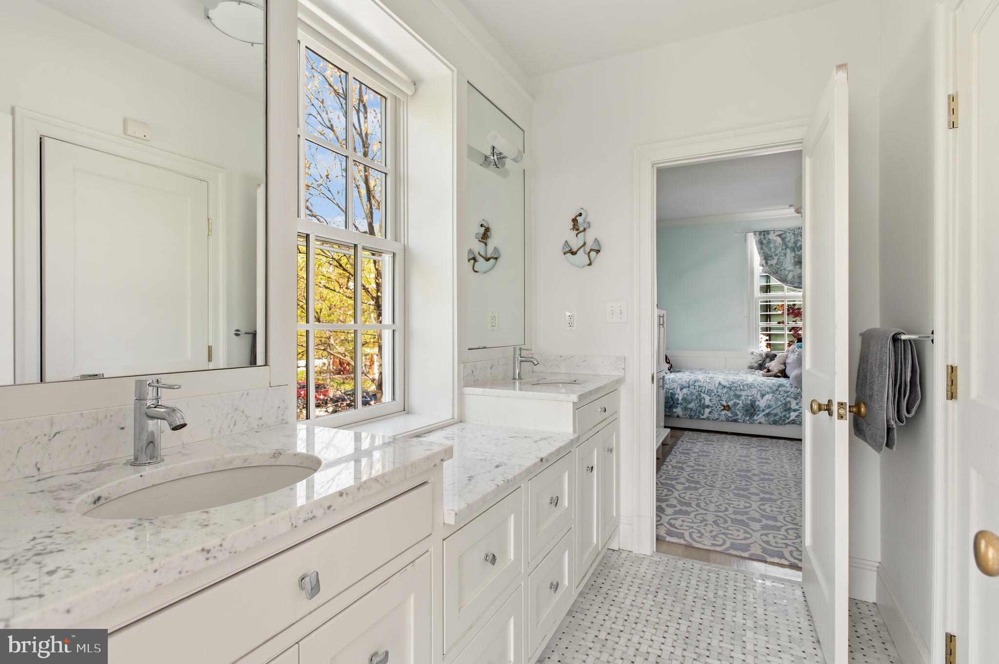 3312 Lowell Street Northwest Washington, DC 20008 - Photo 21 of 44 a spacious bathroom with a granite countertop sink mirror and a