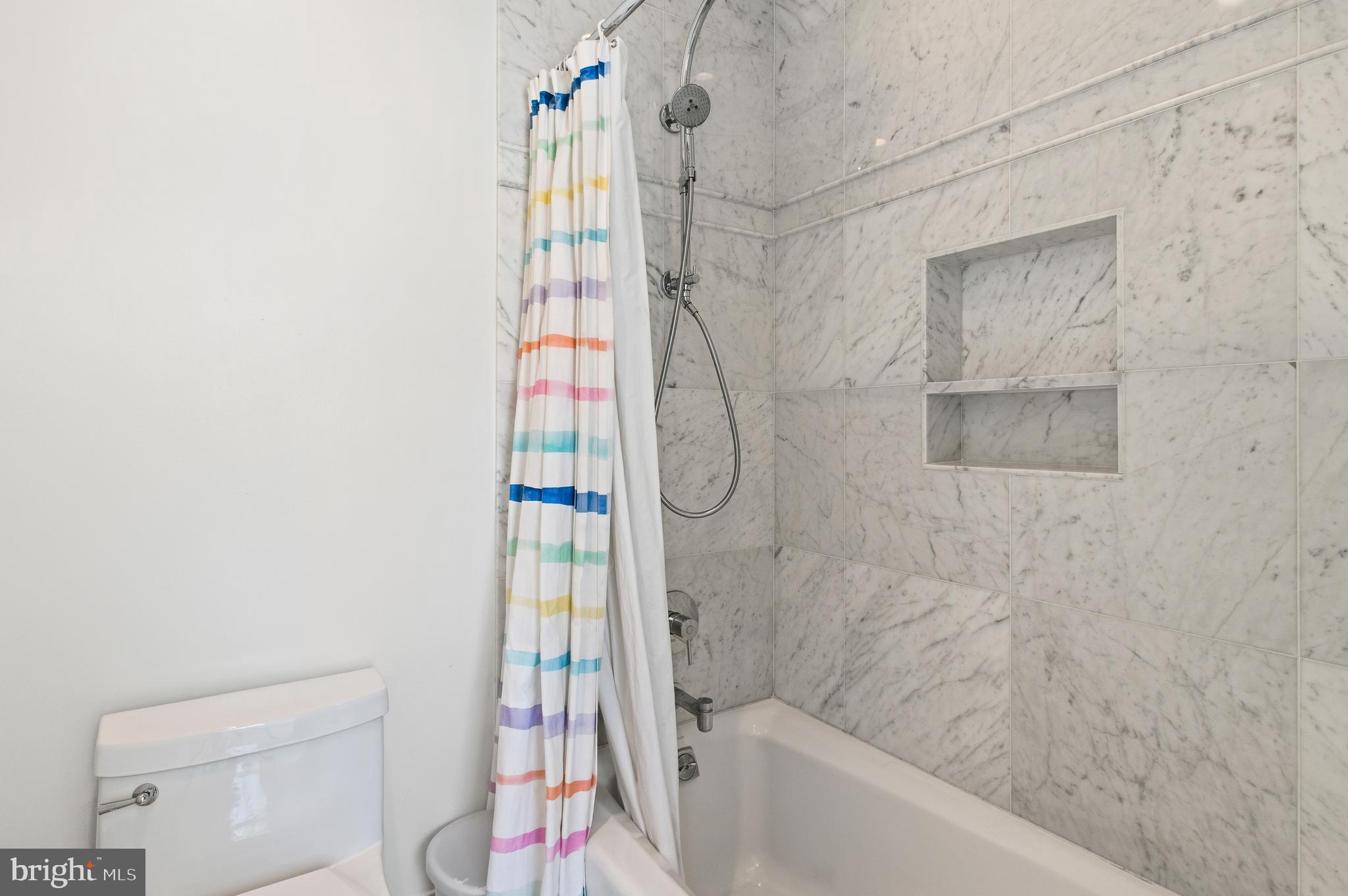 3312 Lowell Street Northwest Washington, DC 20008 - Photo 22 of 44 a bathroom with a bathtub and shower