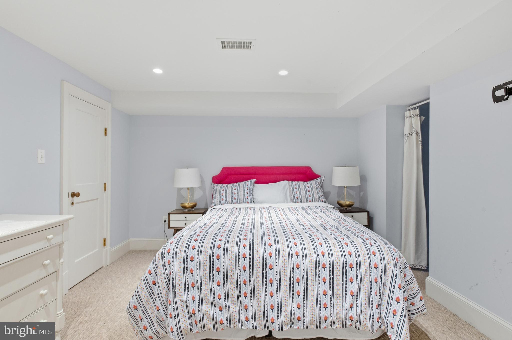 3312 Lowell Street Northwest Washington, DC 20008 - Photo 33 of 44 a bedroom with a bed and a closet